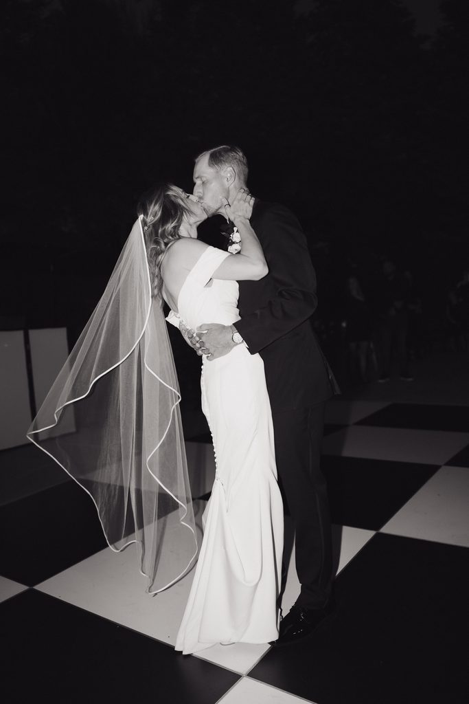 A + M Kissing during their first dance