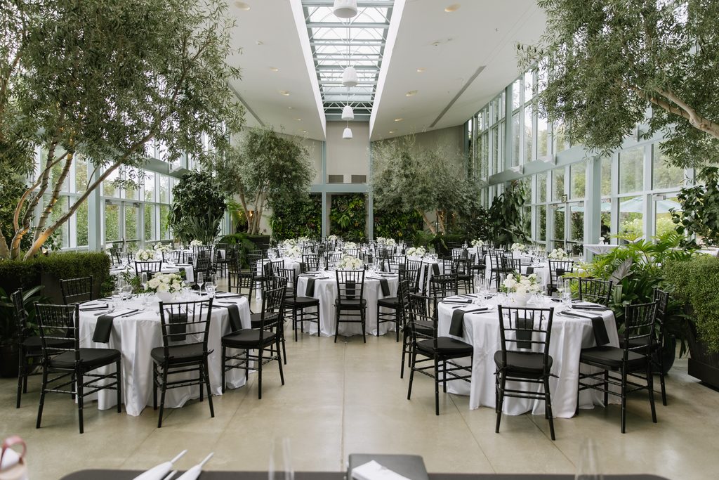 Wedding dinner details inside Orangerie at Red Butte Gardens.