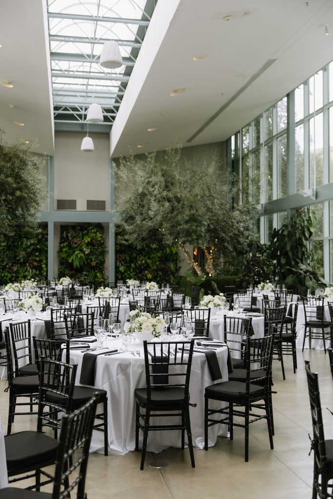Wedding dinner details inside Orangerie at Red Butte Gardens.