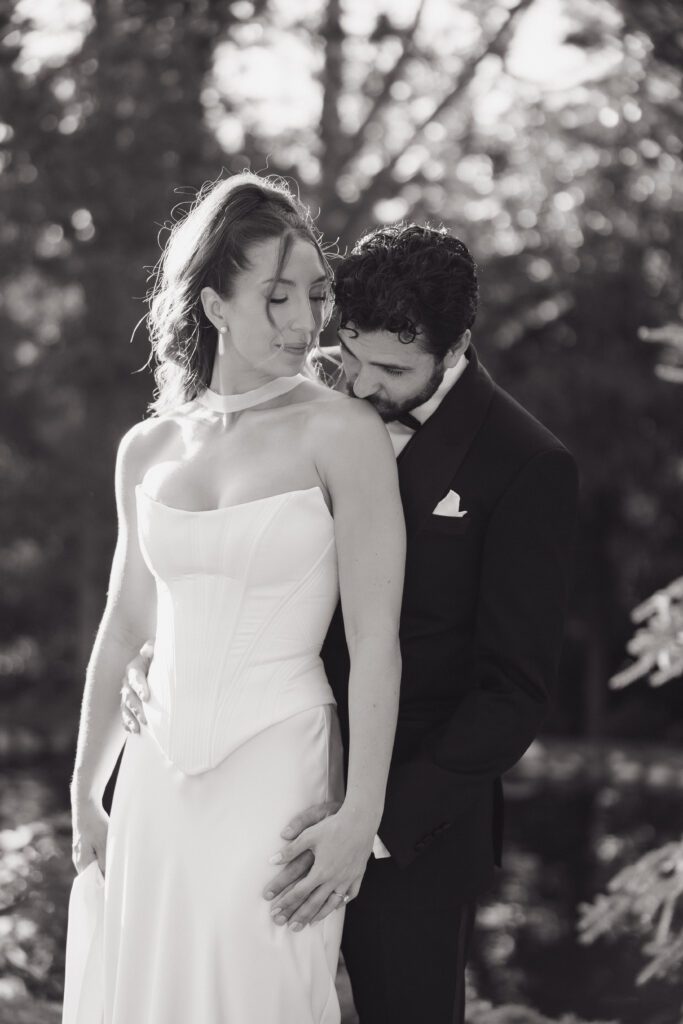 June bridal portraits of M and C among the green gardens at La Caille.