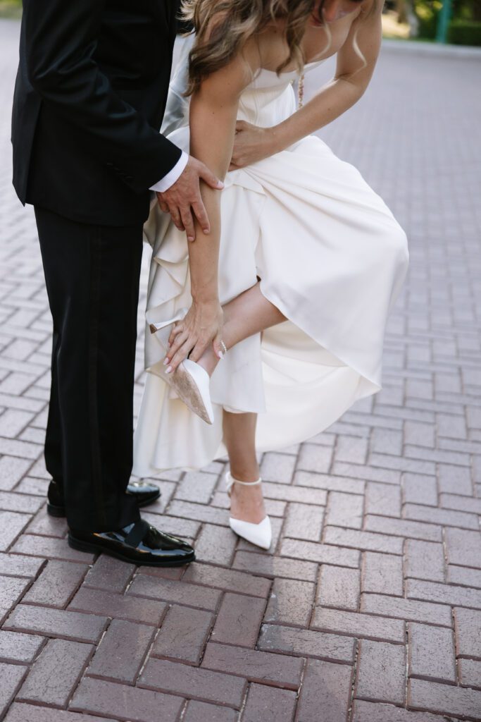 June bridal portraits of M and C among the green gardens at La Caille.