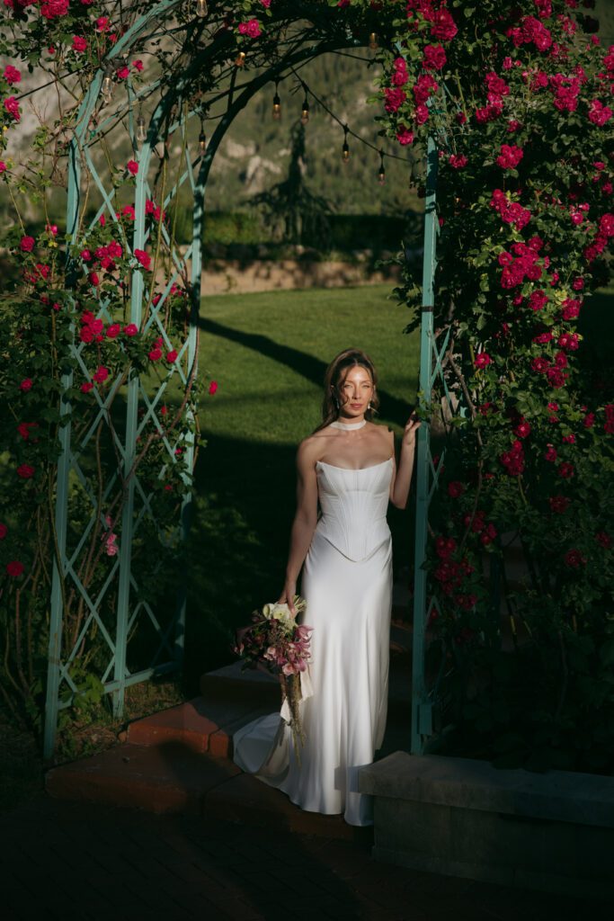 June bridal portraits of M and C among the green gardens at La Caille.