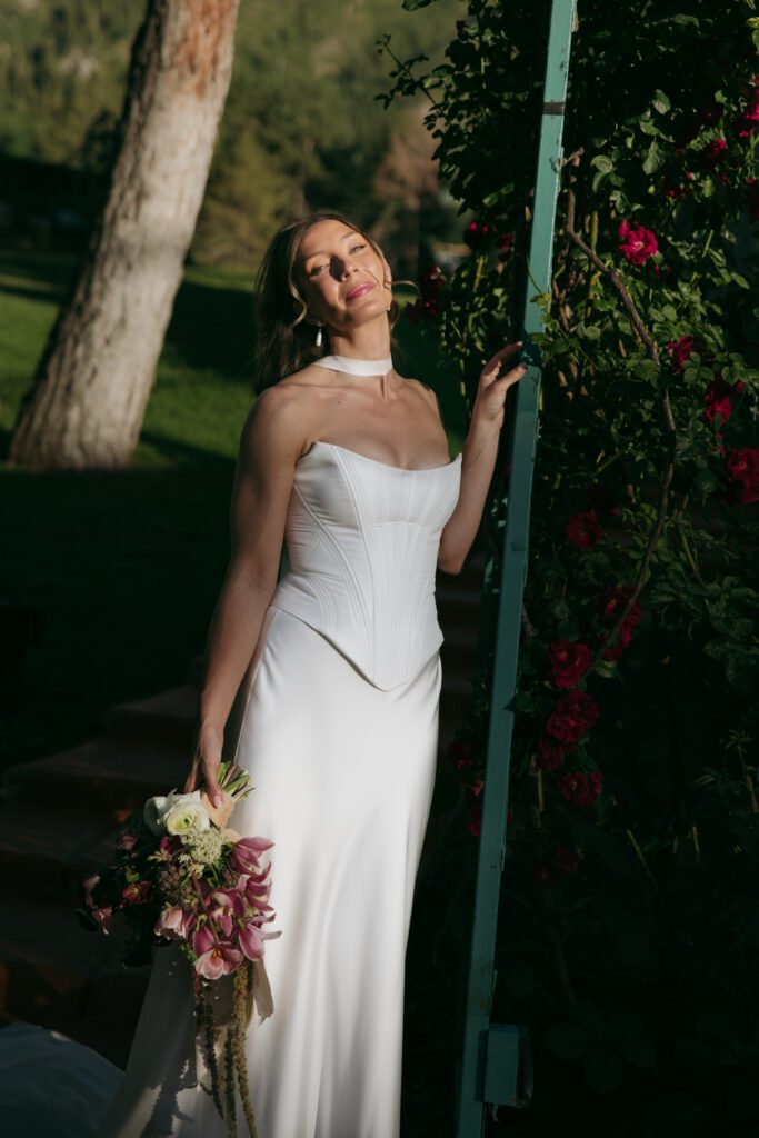 June bridal portraits of M and C among the green gardens at La Caille.
