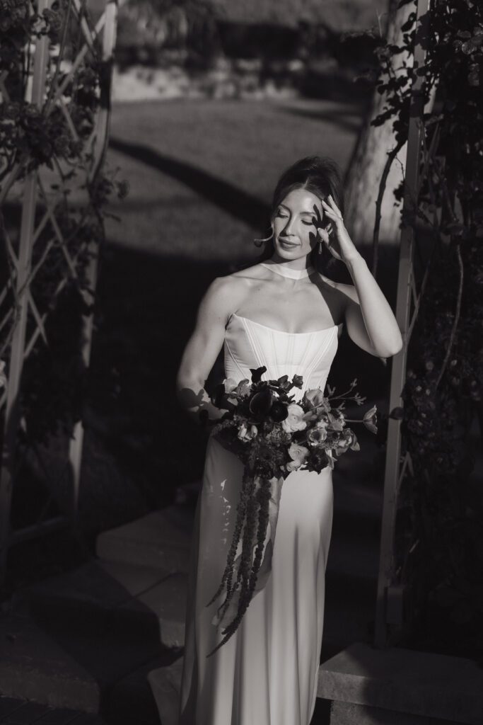 June bridal portraits of M and C among the green gardens at La Caille.