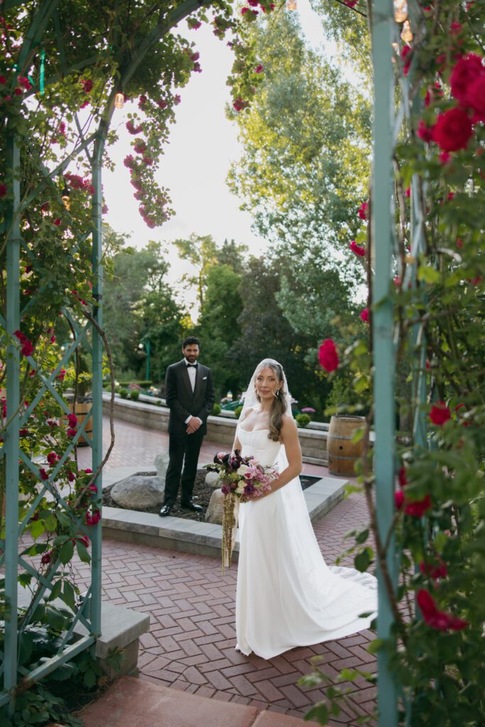 June bridal portraits of M and C among the green gardens at La Caille.