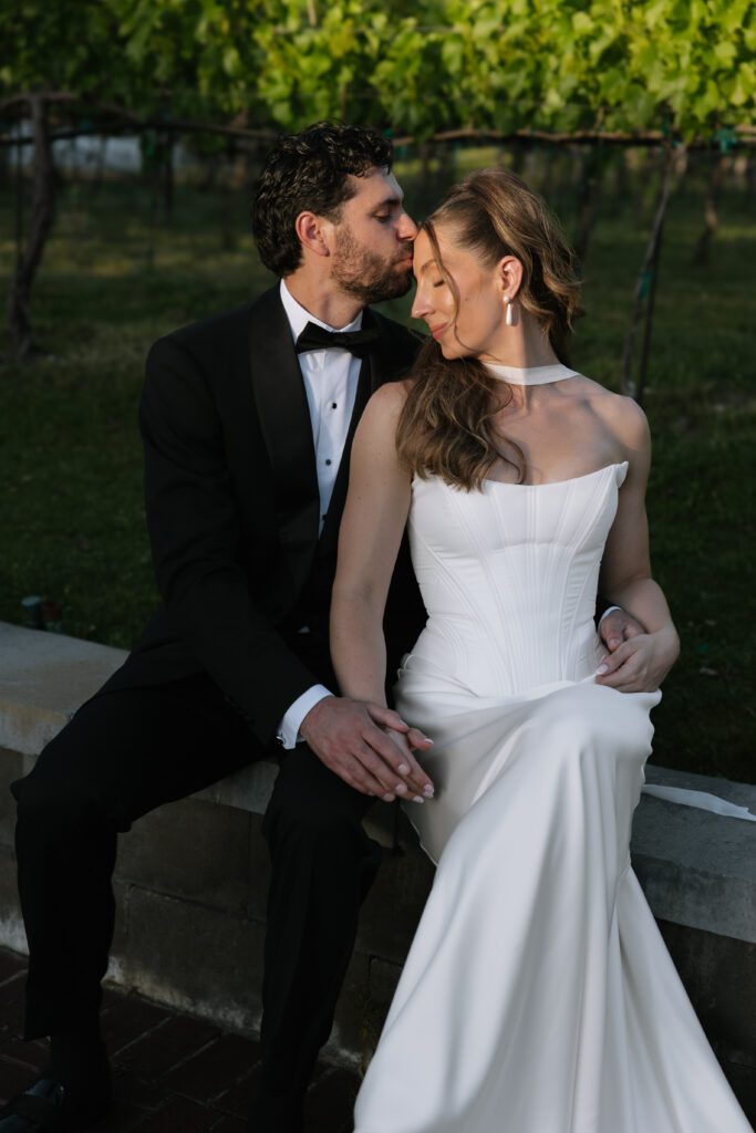 June bridal portraits of M and C among the green gardens at La Caille.