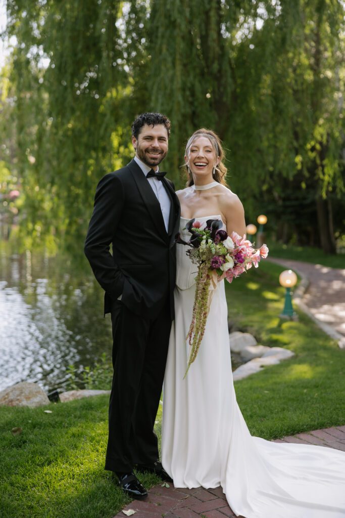 June bridal portraits of M and C among the green gardens at La Caille.